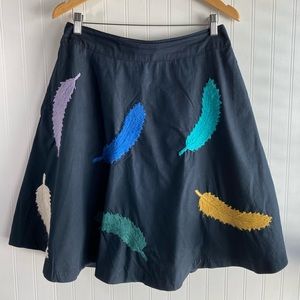 An Anthropologie Feather Skirt